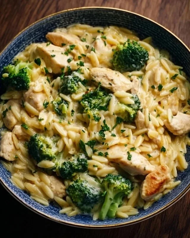 Creamy cheesy chicken and broccoli orzo recipe with vibrant ingredients.