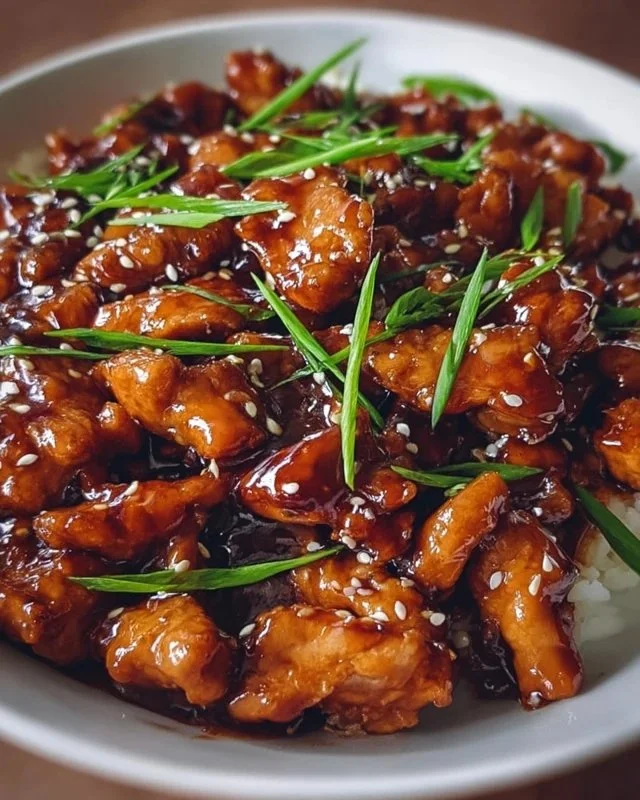 Delicious Mongolian Chicken served with vegetables and rice