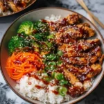 Delicious Sticky Chicken Bowls with vibrant vegetables and sauce