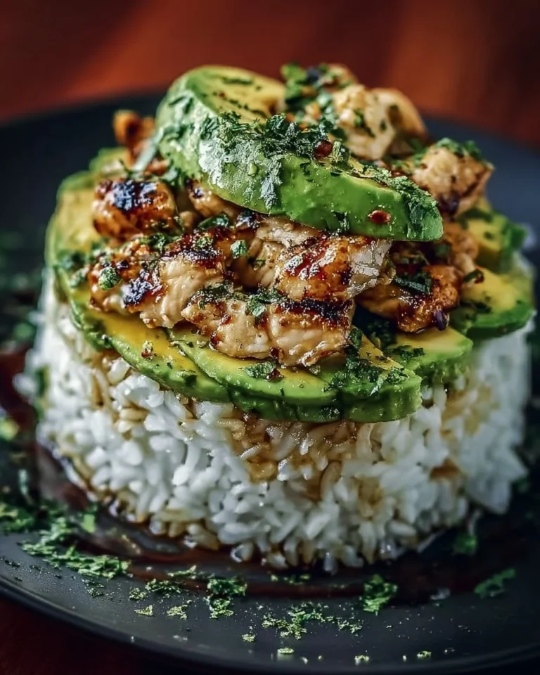 Delicious Honey Lime Chicken and Avocado Rice Stack on a plate
