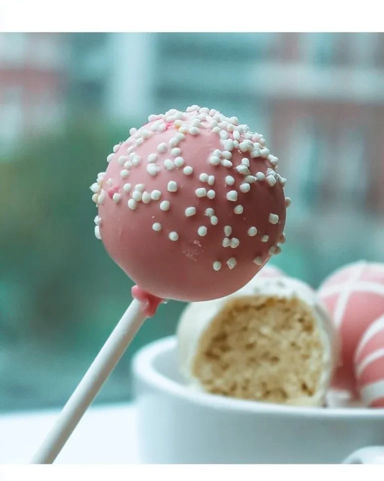 Delicious Starbucks Cake Pop in colorful coating and drizzle
