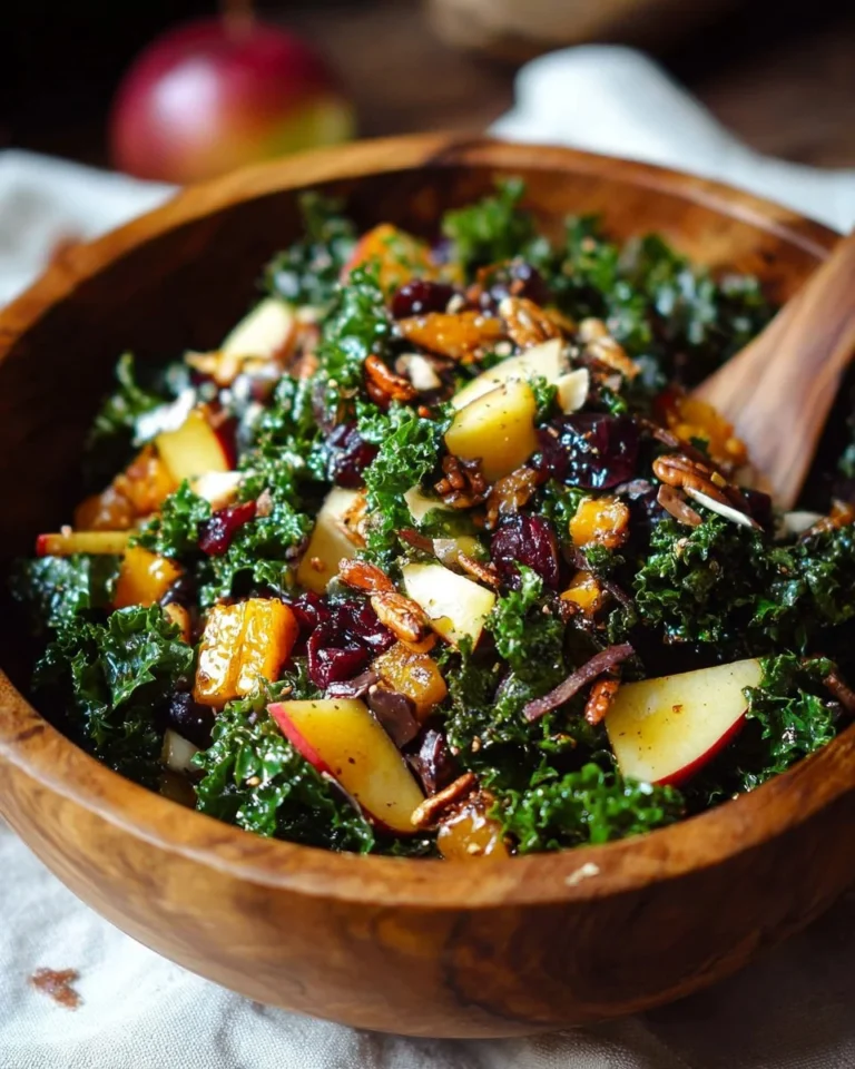 Colorful autumn kale salad with seasonal vegetables and dressing