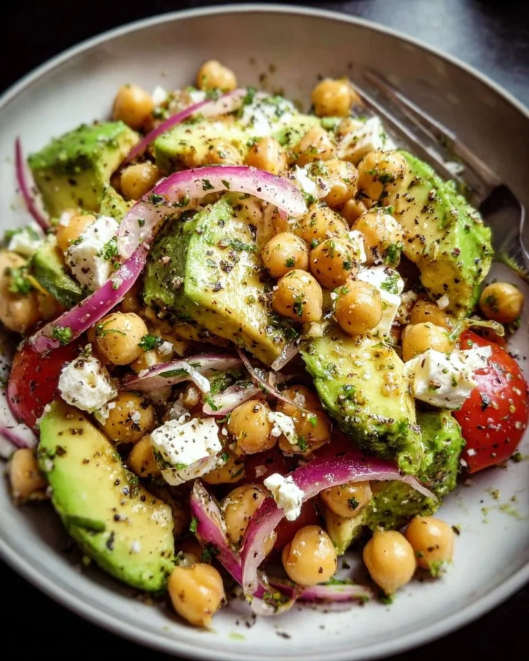 Chickpea Feta Avocado Salad served in a bowl with fresh ingredients