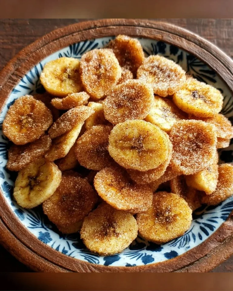 Cinnamon-sugar air fryer banana chips in a bowl