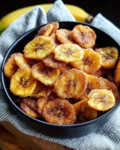 Cinnamon-sugar air fryer banana chips for a delicious and healthy snack.