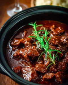 Delicious Slow Cooker Beef Manhattan served with a side of vegetables