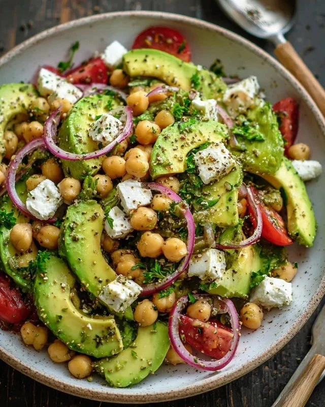 Chickpea Feta Avocado Salad with fresh ingredients in a bowl
