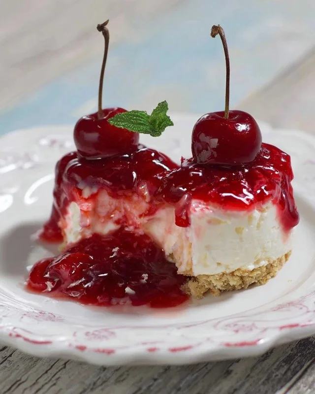Classic Cherry Delight dessert with cherries and whipped cream