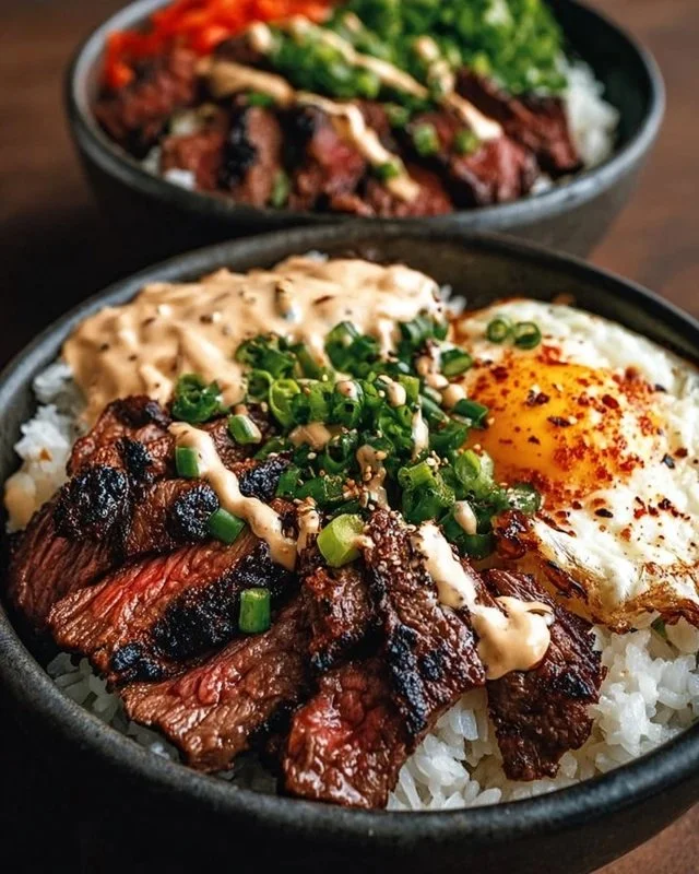 Delicious Korean BBQ Steak Rice Bowl with marinated beef and fresh vegetables