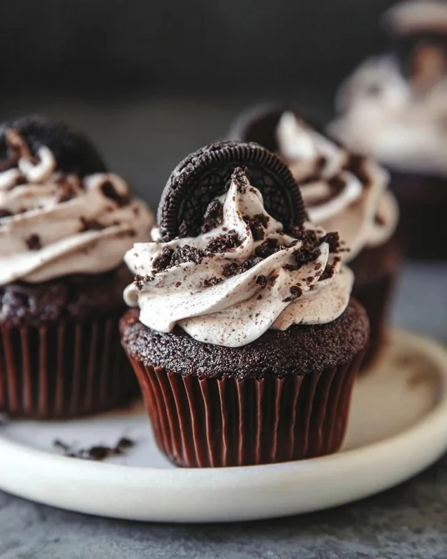 Delicious Oreo chocolate cupcakes topped with creamy frosting and Oreo cookie crumbles