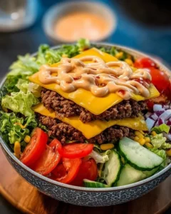 Big Mac Bowls topped with fresh ingredients and a savory sauce