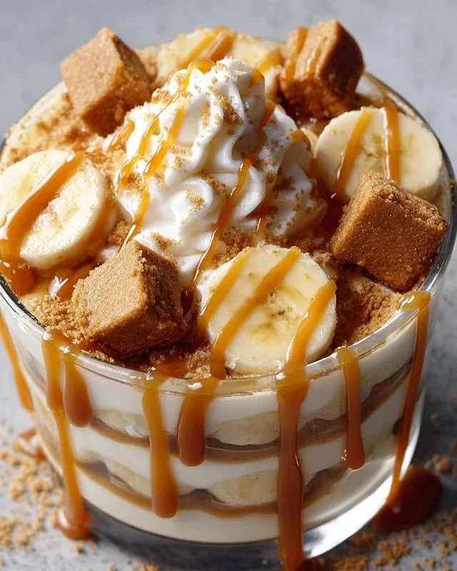 Biscoff Banana Pudding layered with caramel sauce and banana slices