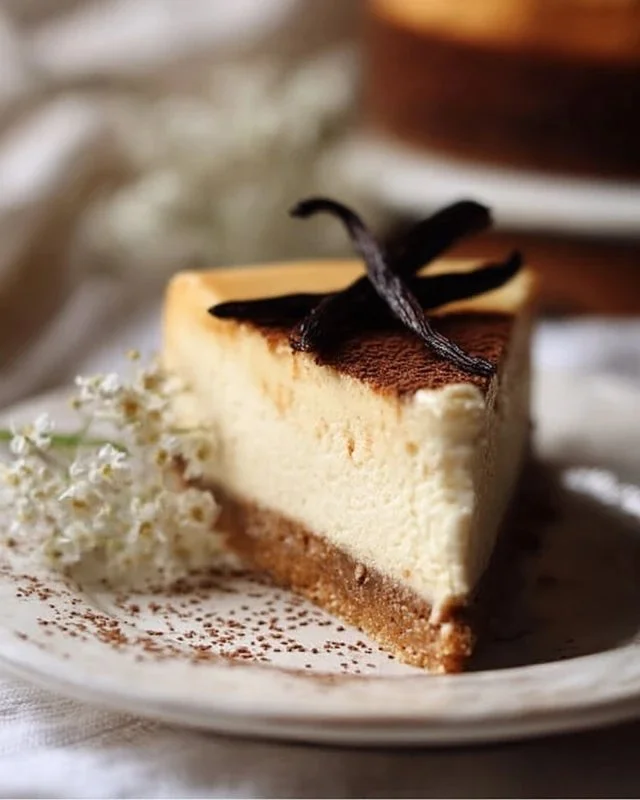Slice of Brown Butter Vanilla Bean Cheesecake on a plate