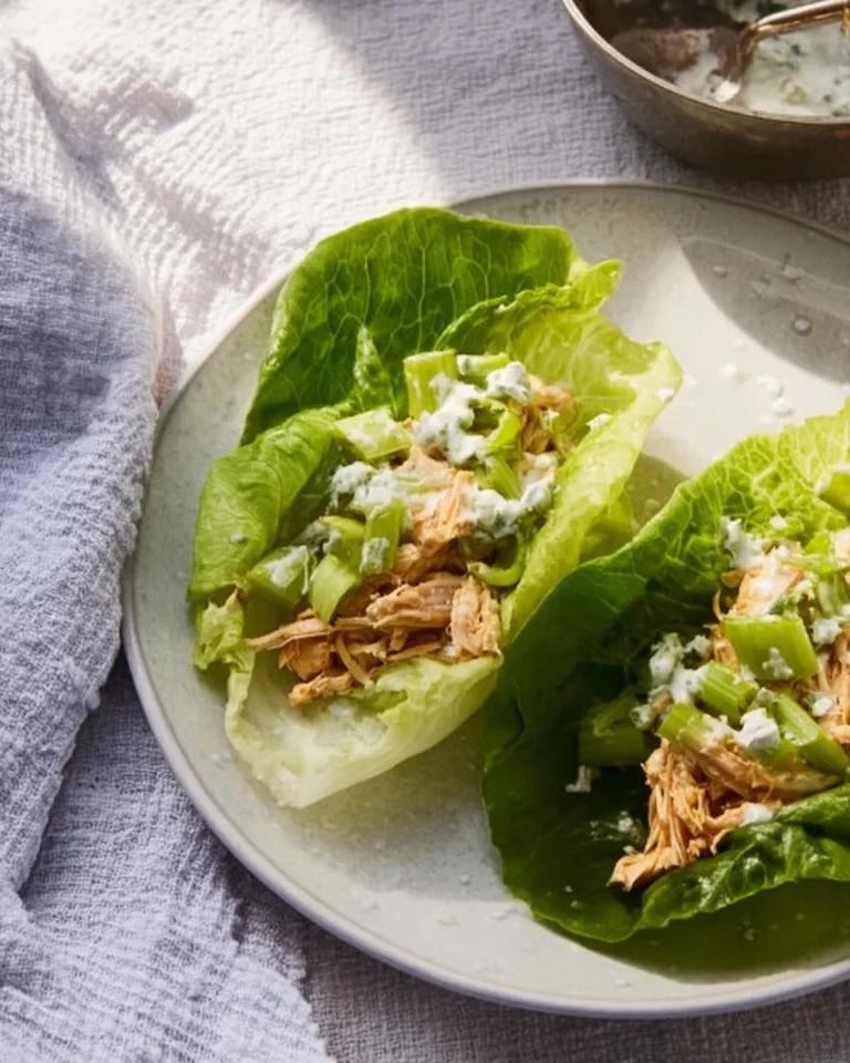 Buffalo Chicken Lettuce Wraps served on a plate with fresh ingredients