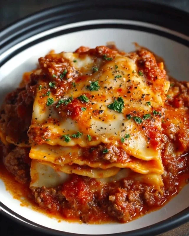 Crockpot Ravioli Lasagna in a cozy kitchen setting, ready to serve.