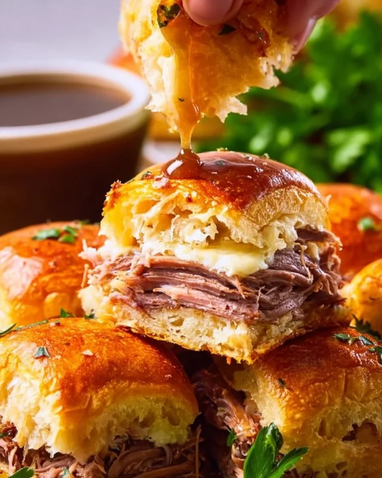 Delicious French Dip Sliders with tender beef and au jus for dipping