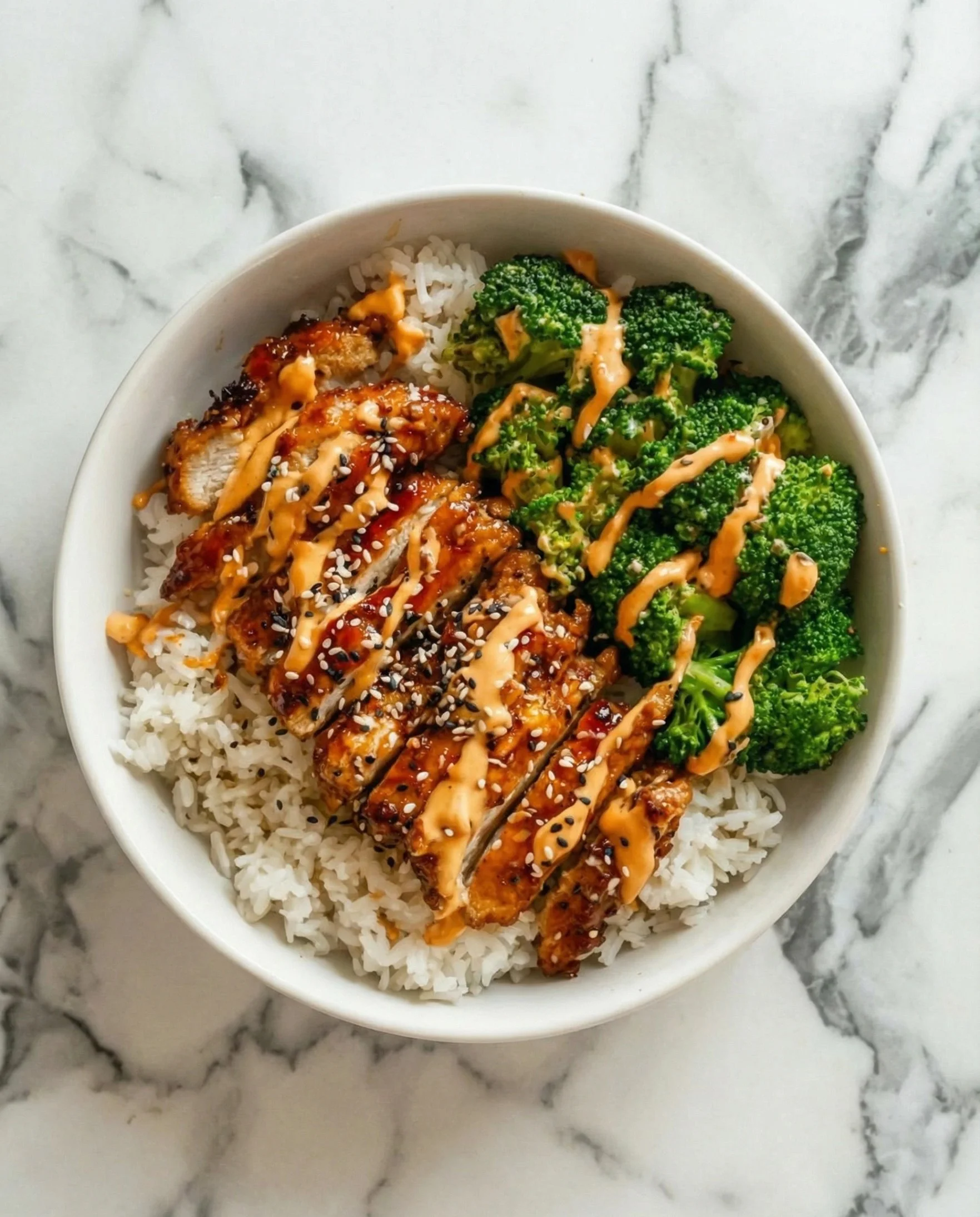 Sticky Chicken Rice Bowls with tender chicken and rice served in a bowl