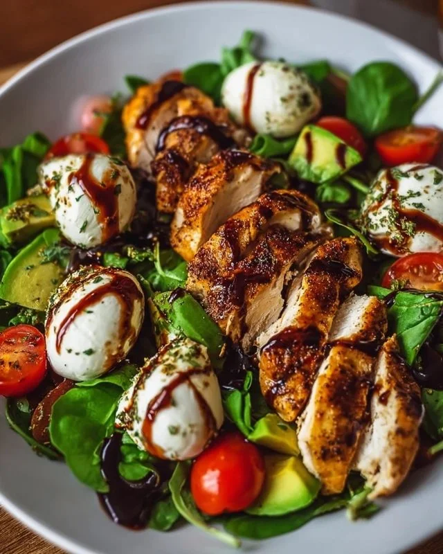 Baked marinated chicken salad with mozzarella and balsamic vinaigrette presentation