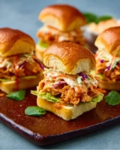 Bang Bang Chicken Sliders with flavorful sauce and fresh ingredients