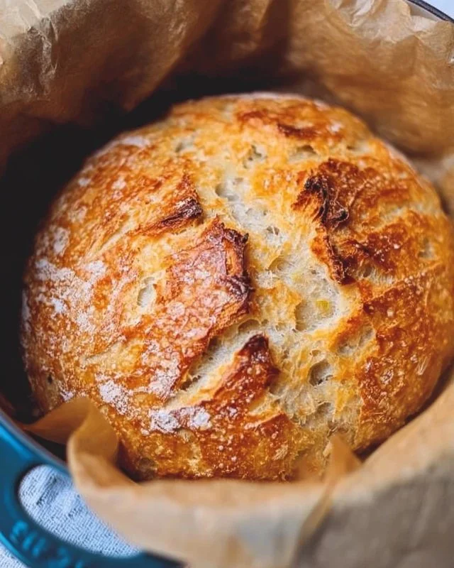 Homemade Dutch Oven No Knead Crusty Bread with golden crust and soft interior
