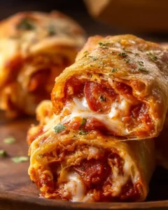 High protein pepperoni pizza rolls on a plate
