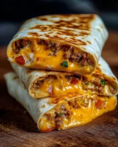 Delicious grilled cheese burrito filled with melted cheese and crispy tortillas.