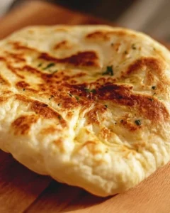 No-oven Turkish bread Bazlama with only 3 ingredients on a wooden board