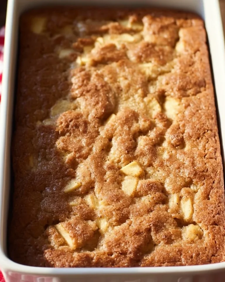 Delicious homemade Amish Apple Cake with fresh apples and spices