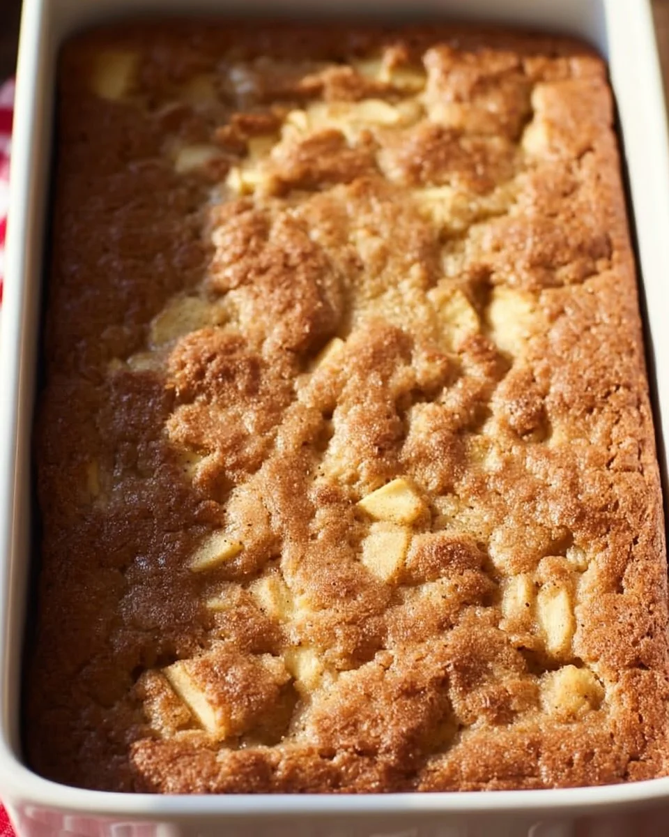 Delicious homemade Amish Apple Cake with fresh apples and spices