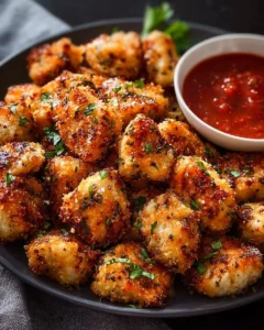 Crispy Garlic Parmesan Chicken Bites served with dipping sauce