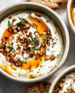 Delicious ricotta dip with hot honey served in a bowl