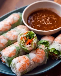 Homemade Vietnamese spring rolls filled with fresh vegetables and herbs