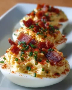 Million Dollar Bacon Deviled Eggs served on a platter