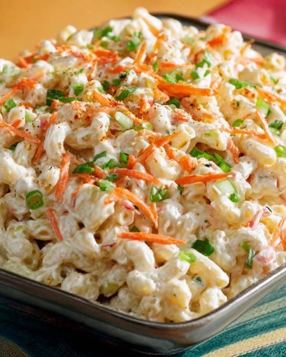 Ono Hawaiian BBQ macaroni salad in a bowl with fresh ingredients