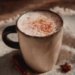 Delicious Vanilla Chai Tea Latte topped with whipped cream and spices